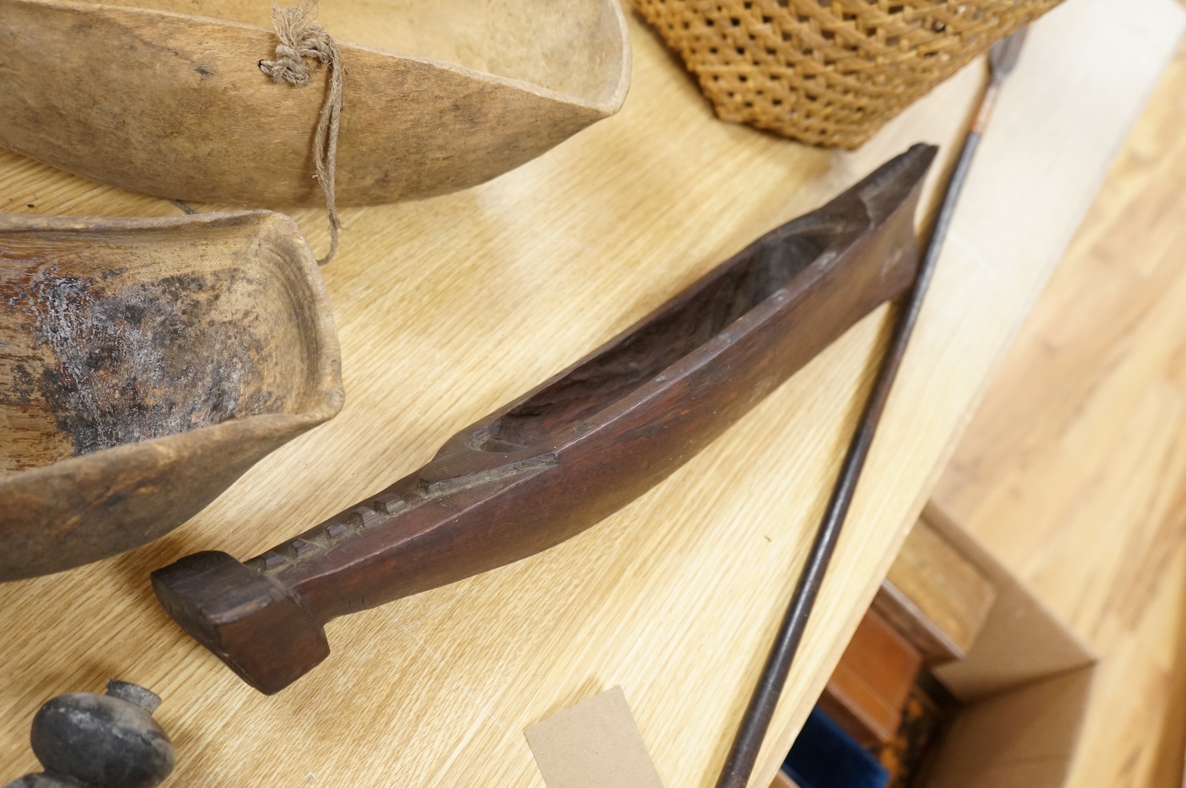 Tribal interest; A collection of various African carvings, a basket and spear